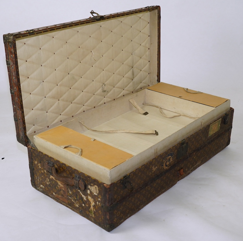 A Louis Vuitton steamer trunk, with original compartmented inner tray, 112cm wide, 56cm deep, 35cm high